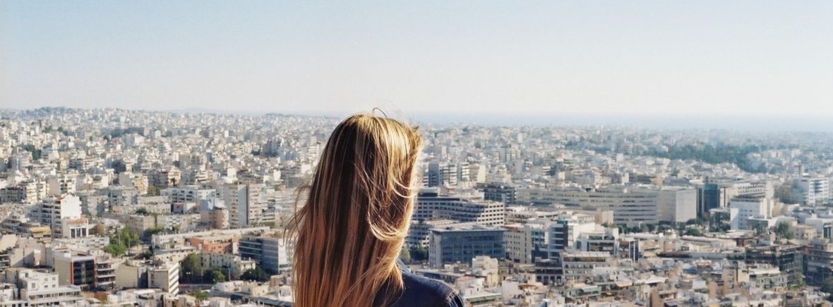 career management woman looking over city vista